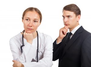 Doctor and her lawyer thinking about how to solve the problem
